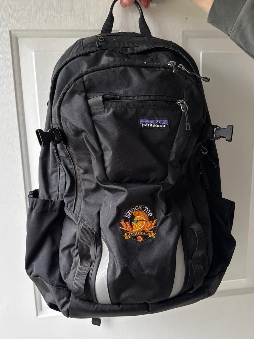 Patagonia Black Backpack with Reflective Stripes